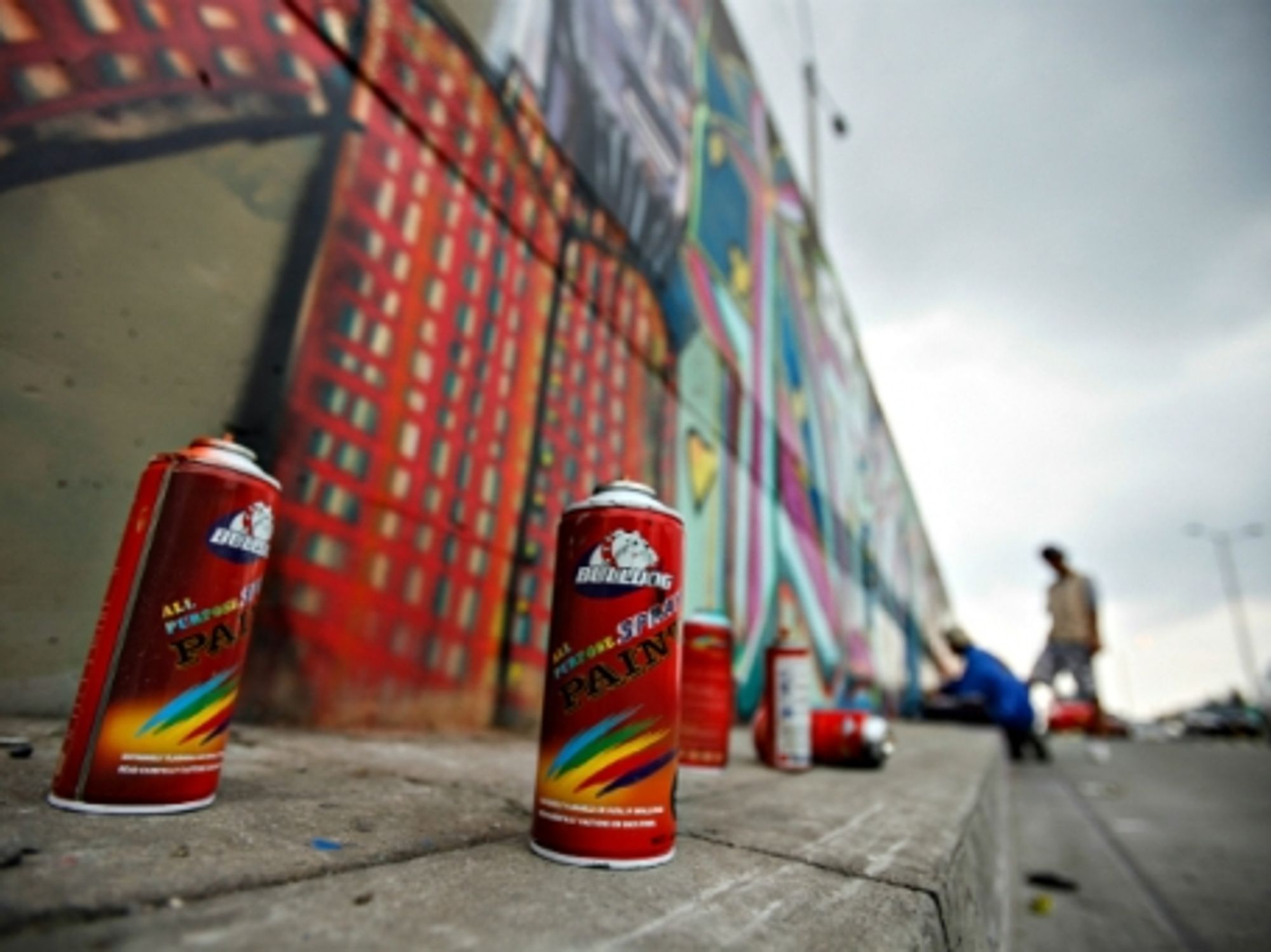 Graffiti artists at work in Bogota