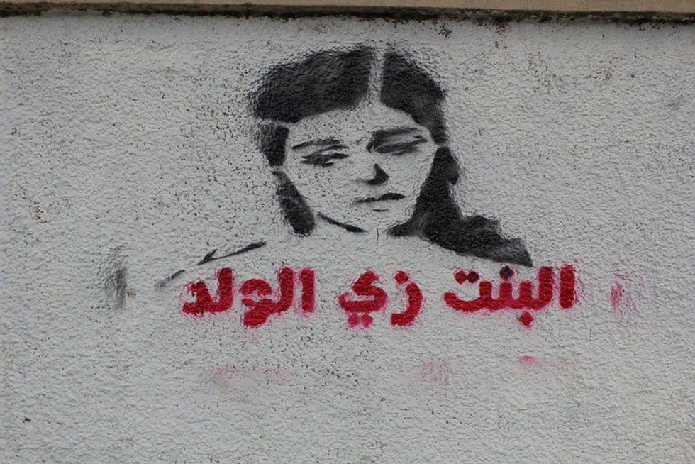 Graffiti in Egypt that reads "the girl is like the boy," March 10, 2012.​