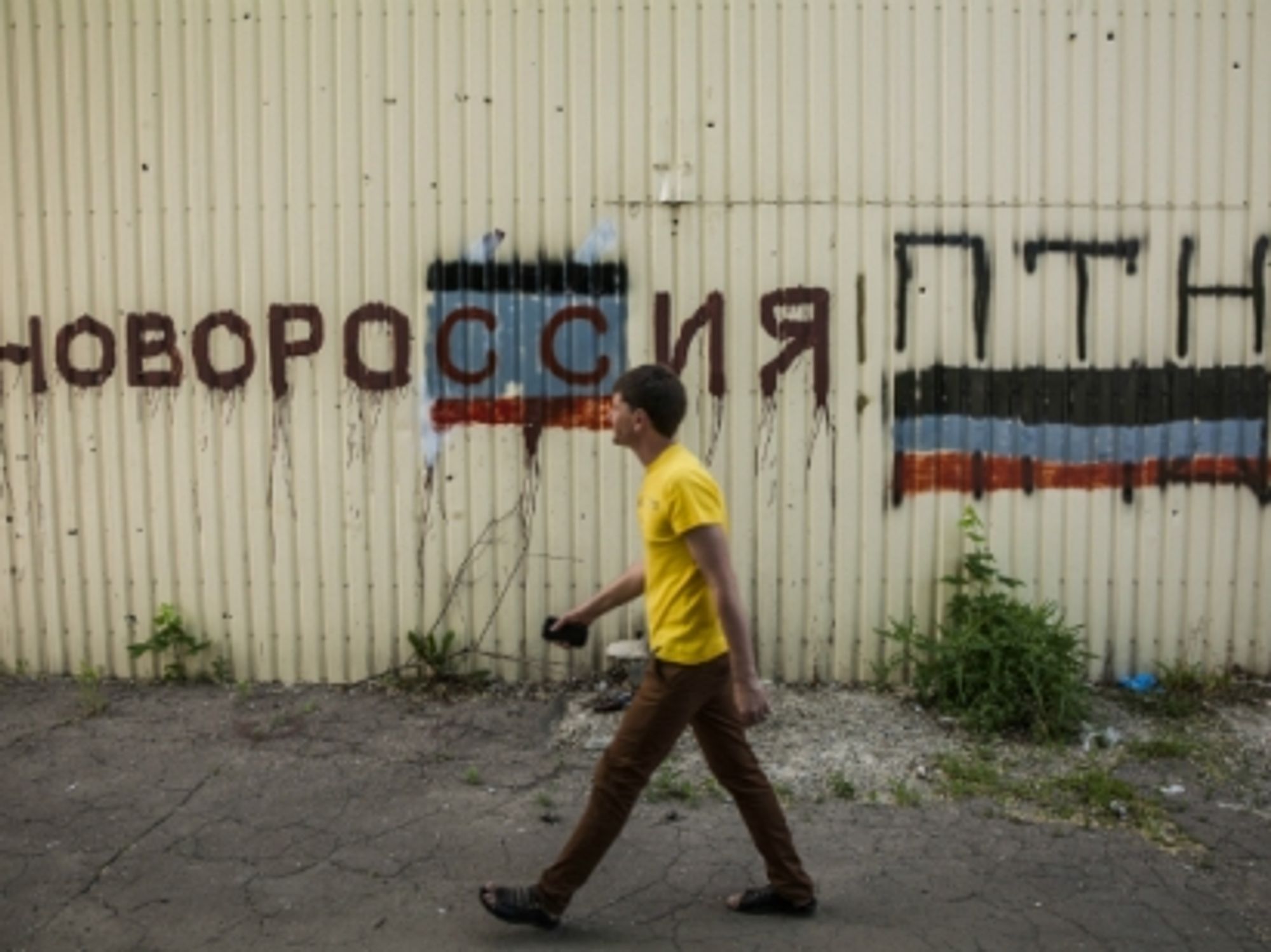 Graffiti over a wall in Donetsk, eastern Ukraine, says ''Novorossiya! Putin''