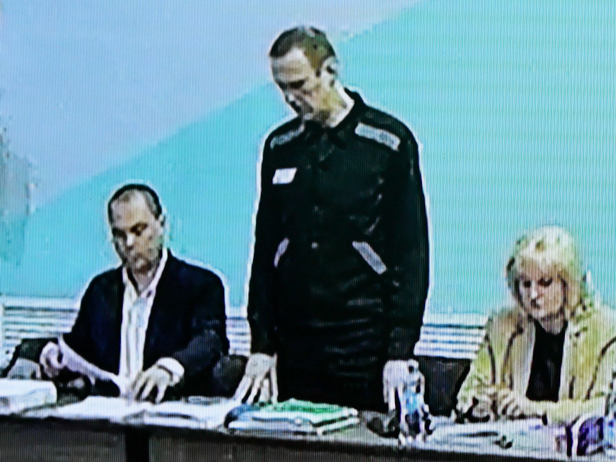 grainy photo of screenshot of Navalny in prison court