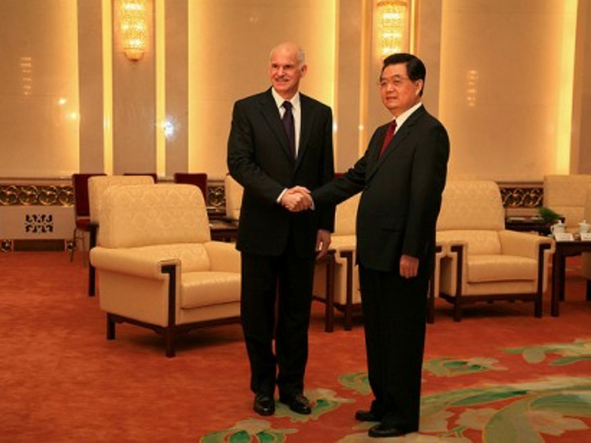 Greek Prime Minister George Papandreou shaking hands with Chinese President Hu Jintao