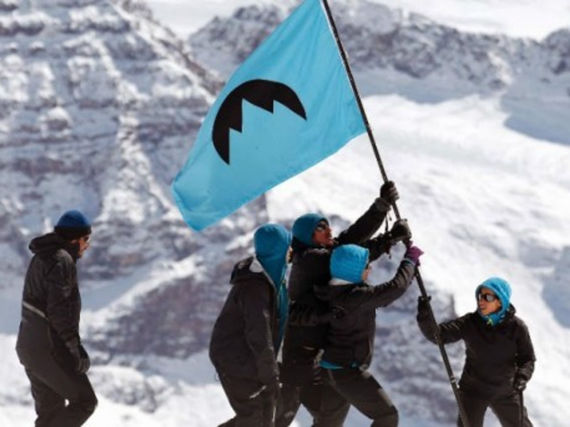 Greenpeace activists planting the Glacier Republic flag