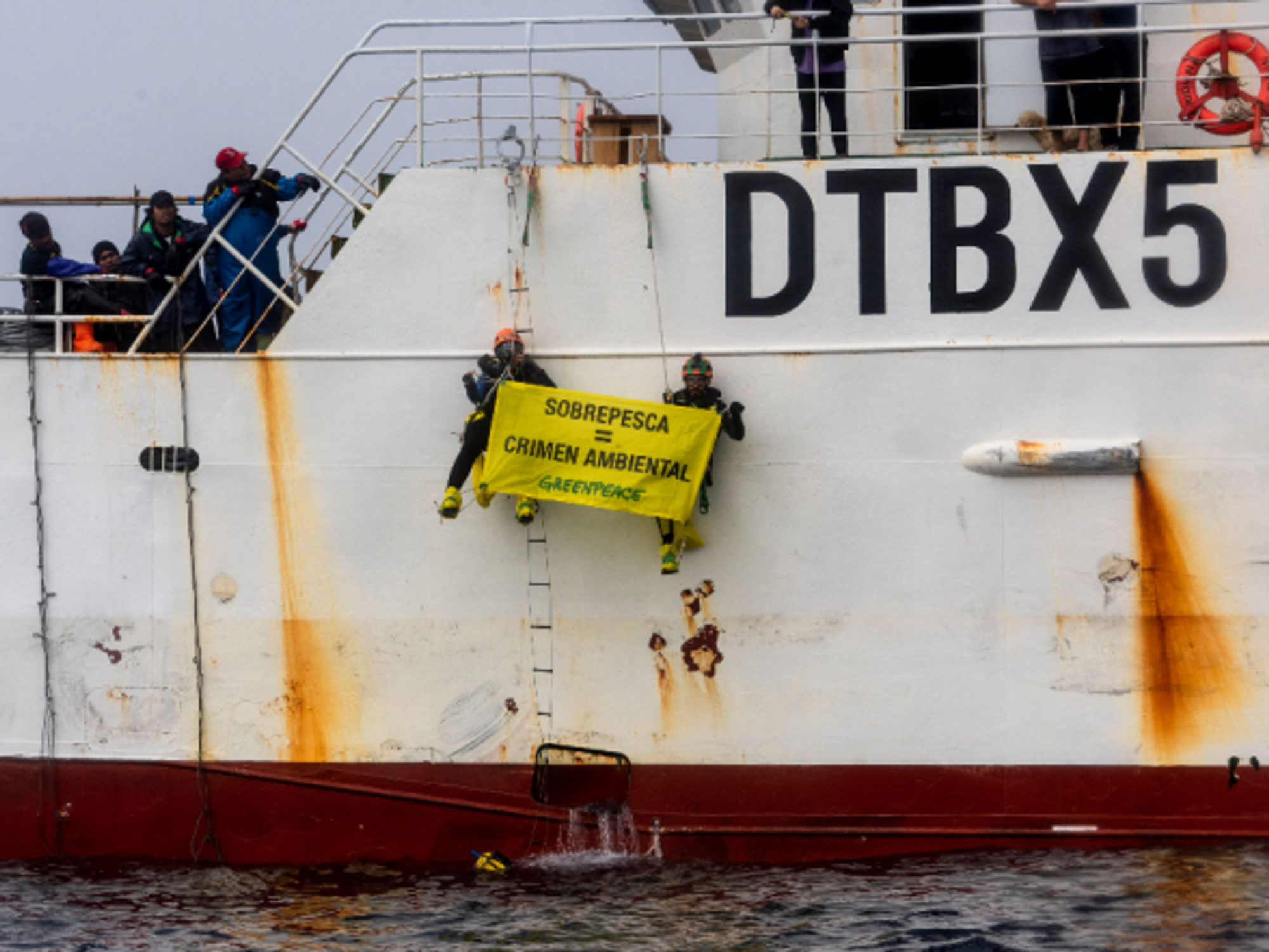 Greenpeace activists protesting in Argentina's 'Agujero Azul' biodiversity hotspot