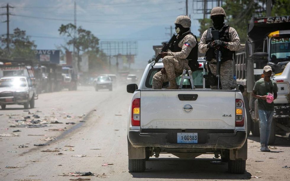 Haiti police on patrol.