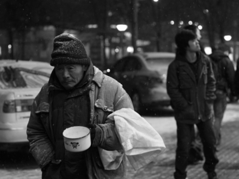 Hard times are usually hidden in modern China's big cities