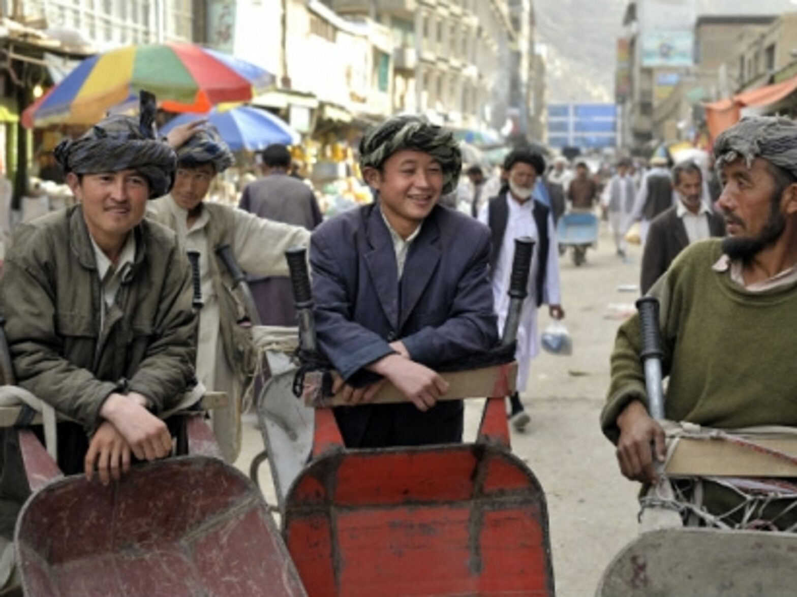 Hazara men at Kabul's Pashtun Bazaar.