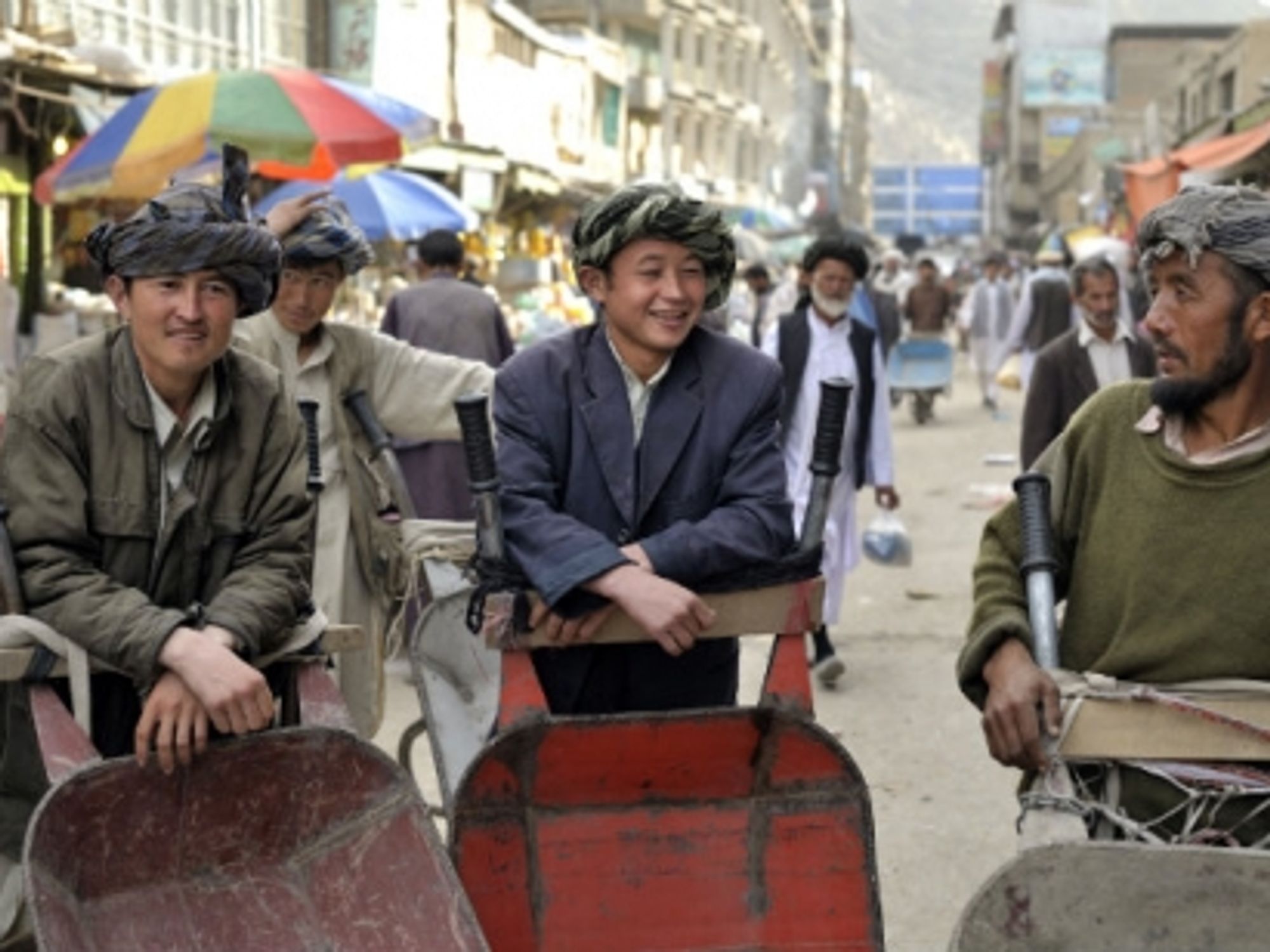 Hazara men at Kabul's Pashtun Bazaar.