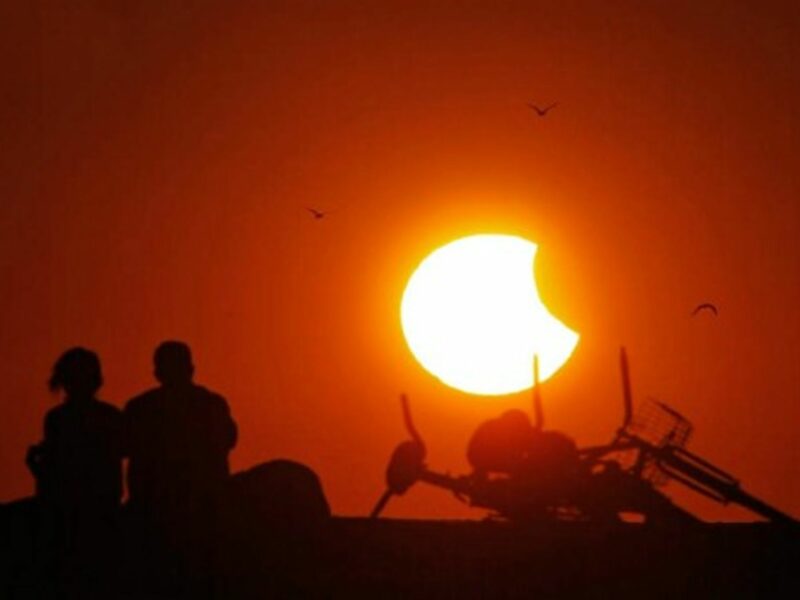 he sun sets over the Gulf of Mexico Thursday, during a partial solar eclipse.