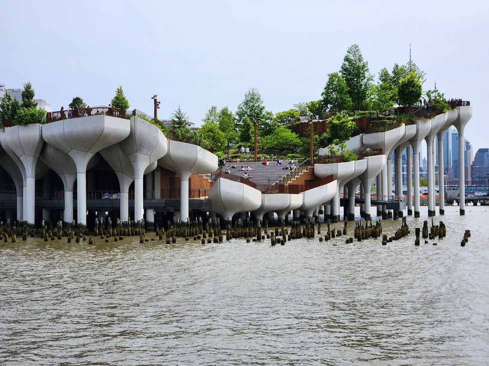Heavy movement of people at Little Island park on Pier 55. It is a public artificial island located in the Hudson River, west of Manhattan in the city of New York, adjacent to Hudson River Park.