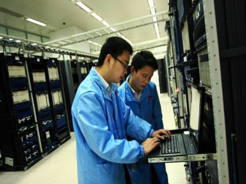 Huawei staff performing routine maintenance
