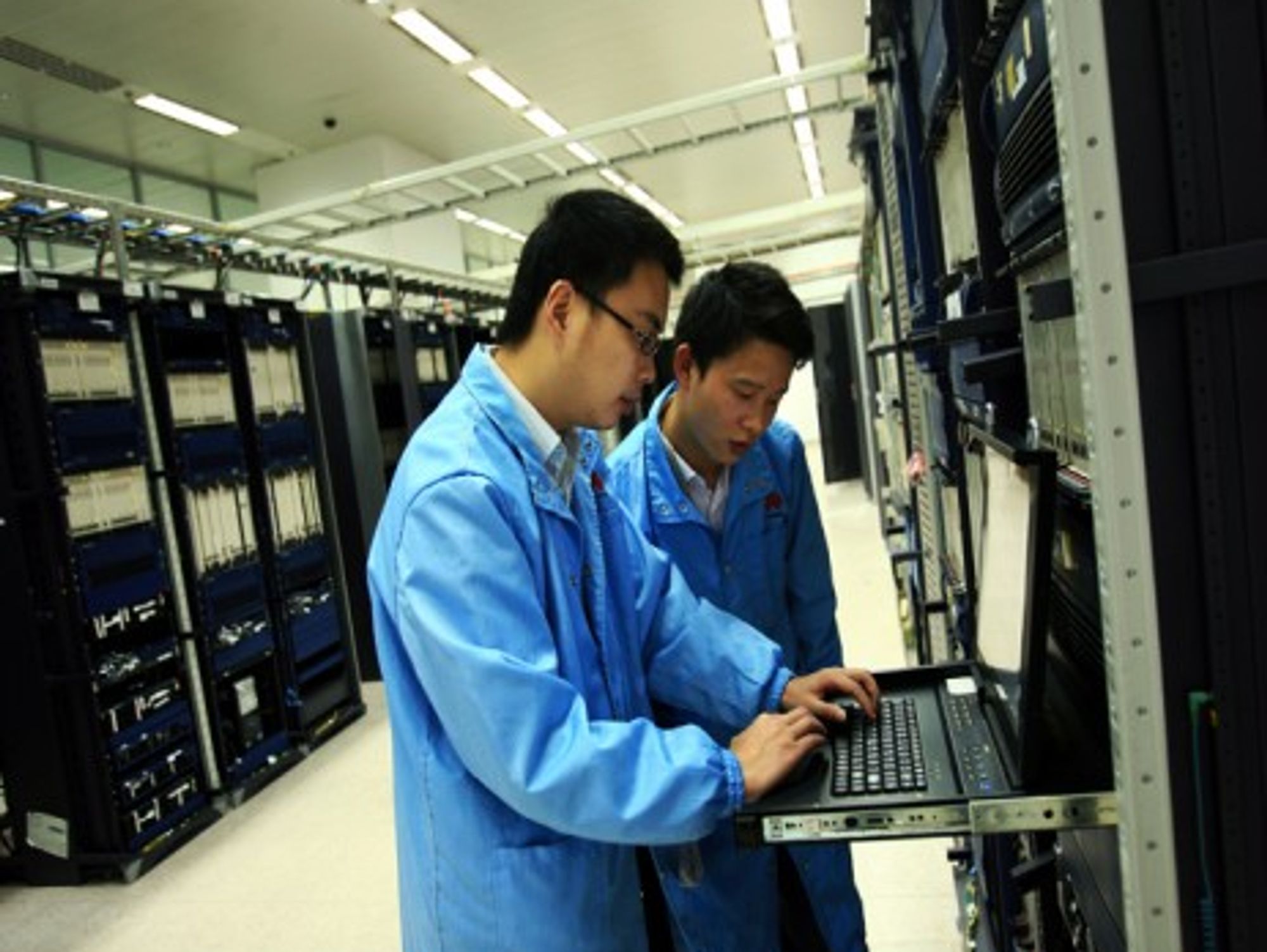 Huawei staff performing routine maintenance