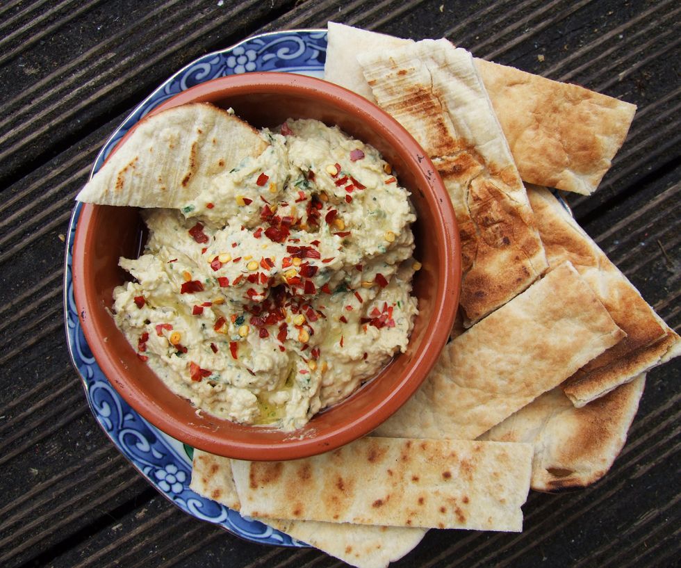 Hummus platter with bread.