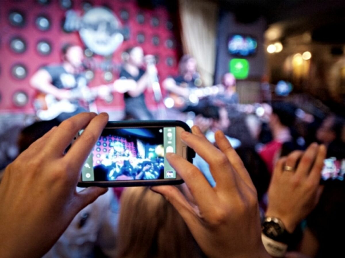 Hundreds of potential concert photographers