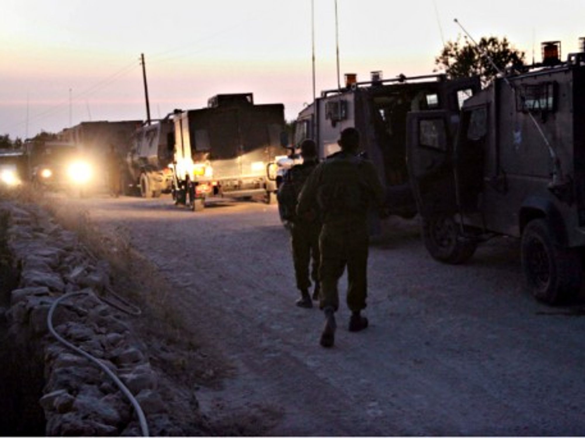 IDF soldiers on patrol in Halhul on June 30.