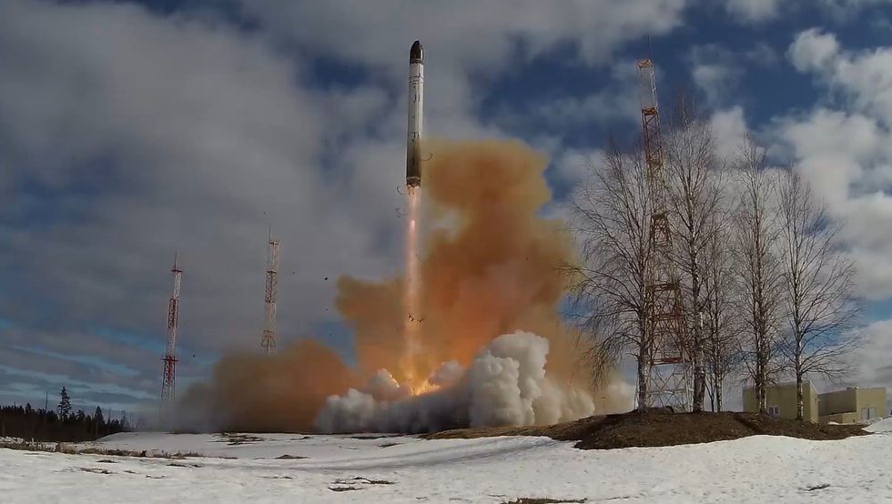 Image of a ballistic missile launched in a snowy forest in Russia