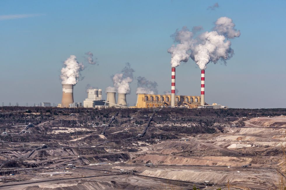image of a coal power plant emitting smoke