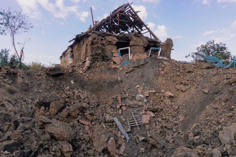 image of a destroyed house