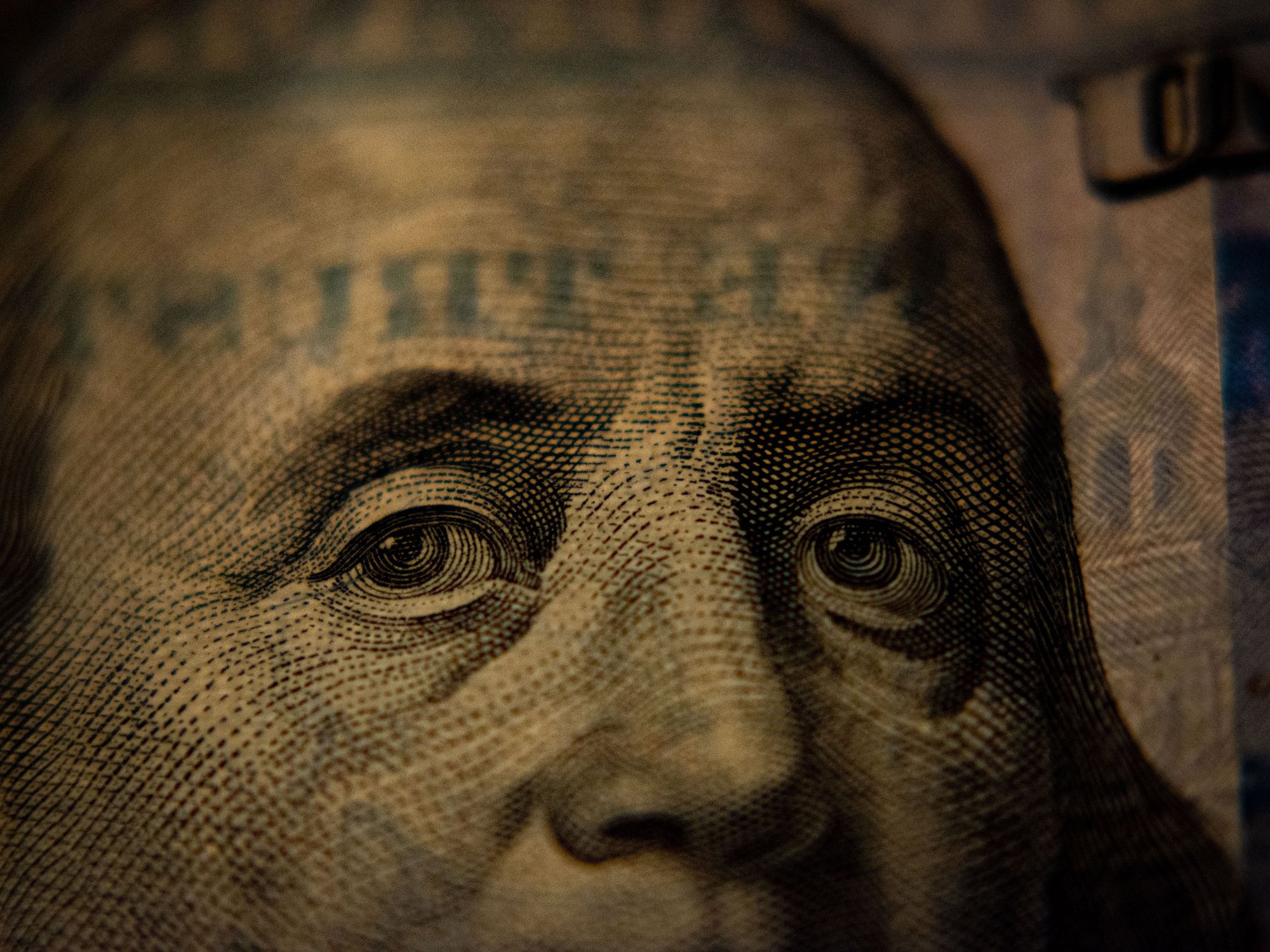 Image of a ​close up of a one dollar American bill.