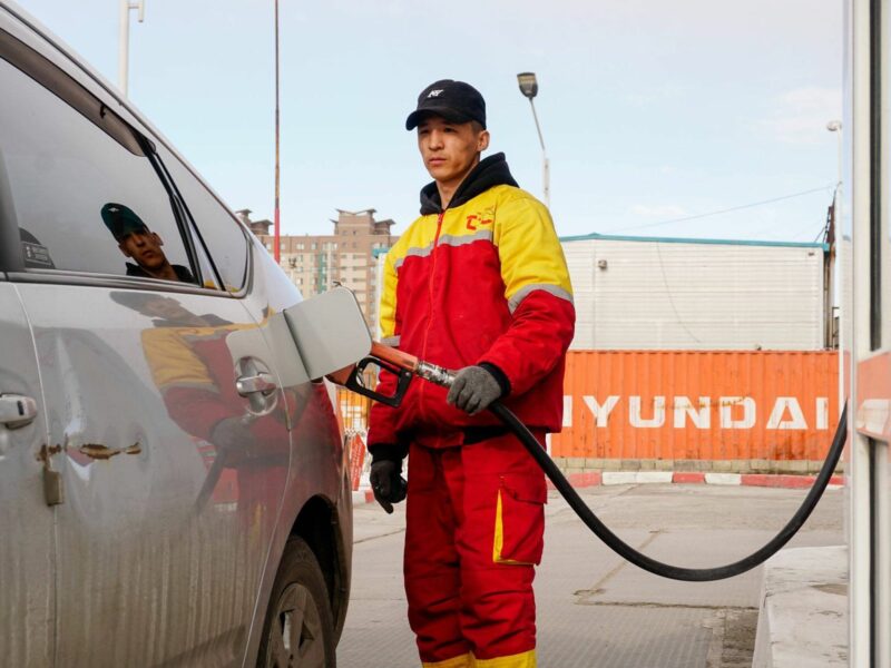 Image of a man working at a gas station