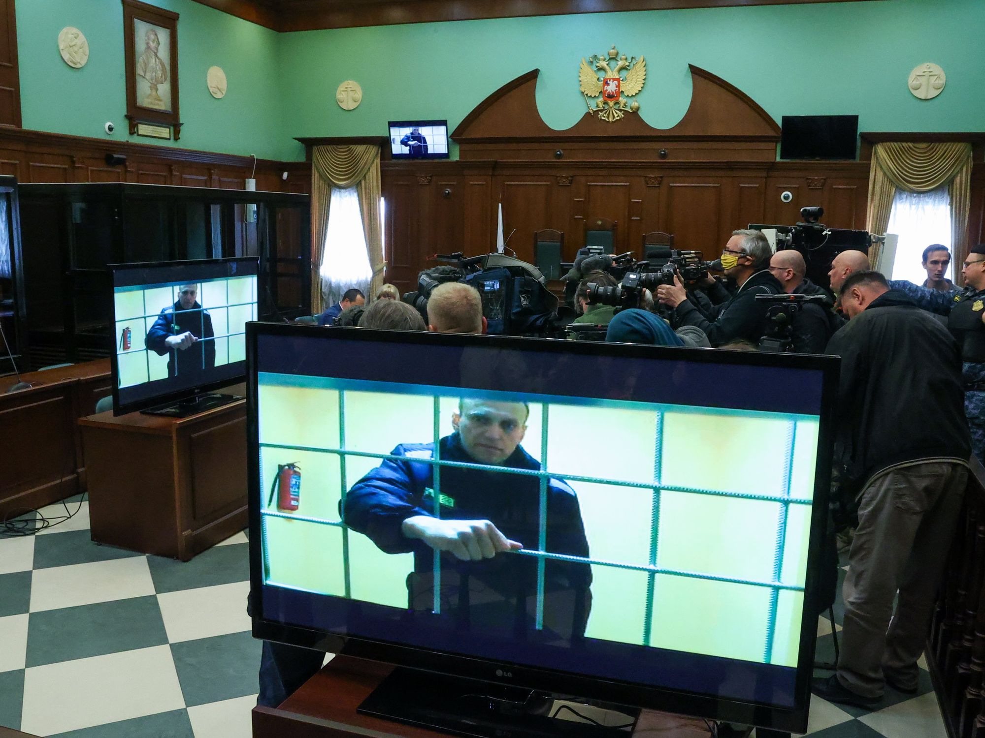 Image of a screen showing opposition activist Alexei Navalny via video link from Pokrov's Penal Colony No 2 in the Moscow City Court.