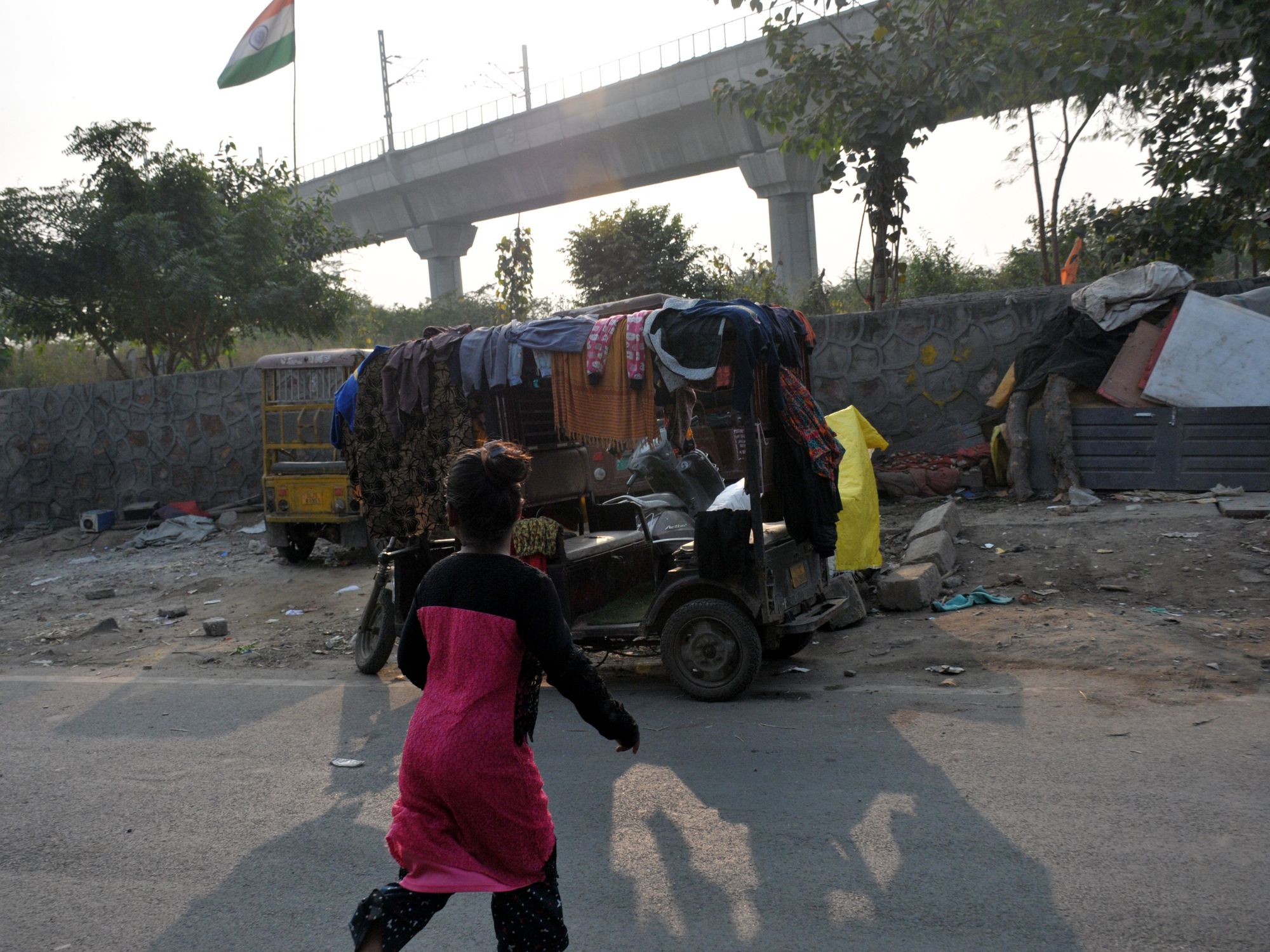 image of a slum with a girl