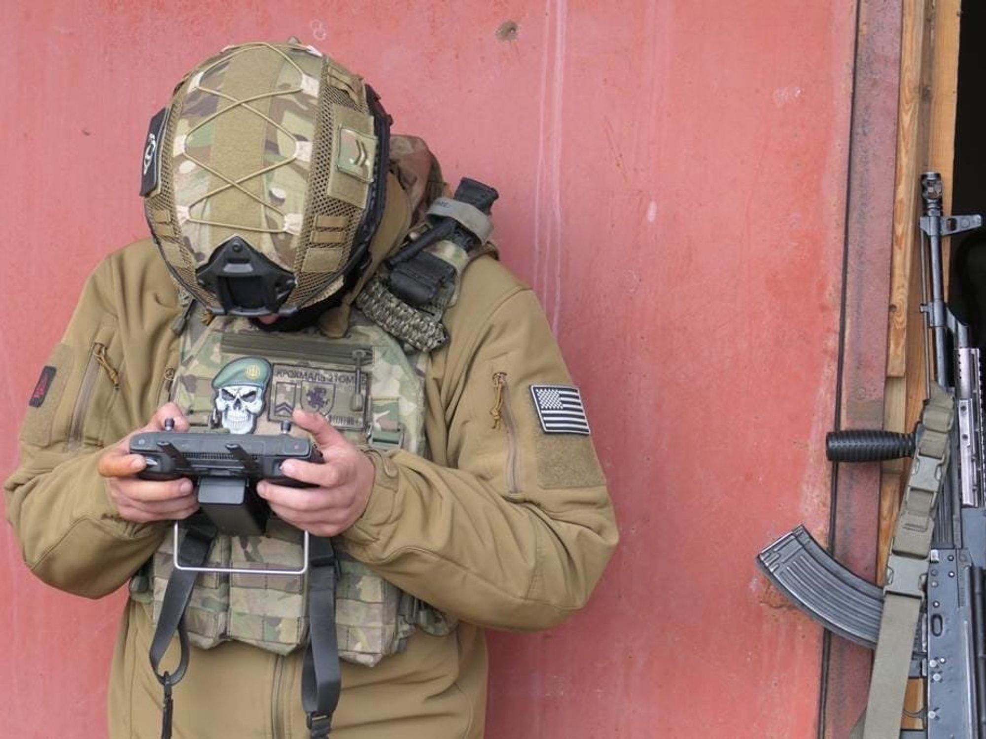 Image of a soldier from the 56th Mariupol Motorized Brigade looking straight into his DJI Matrice 300 RTK quad copter.