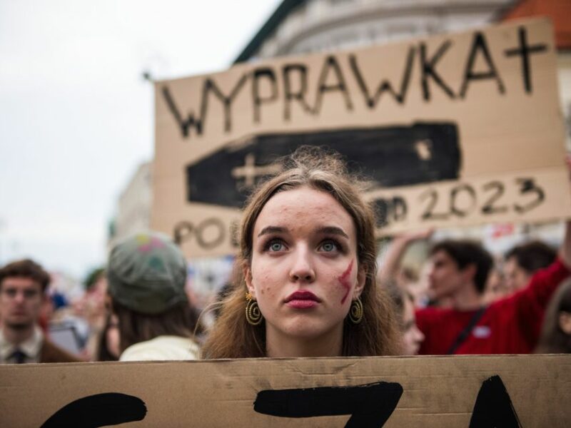 Image of a woman at a protest against harsh abortion laws in Poland