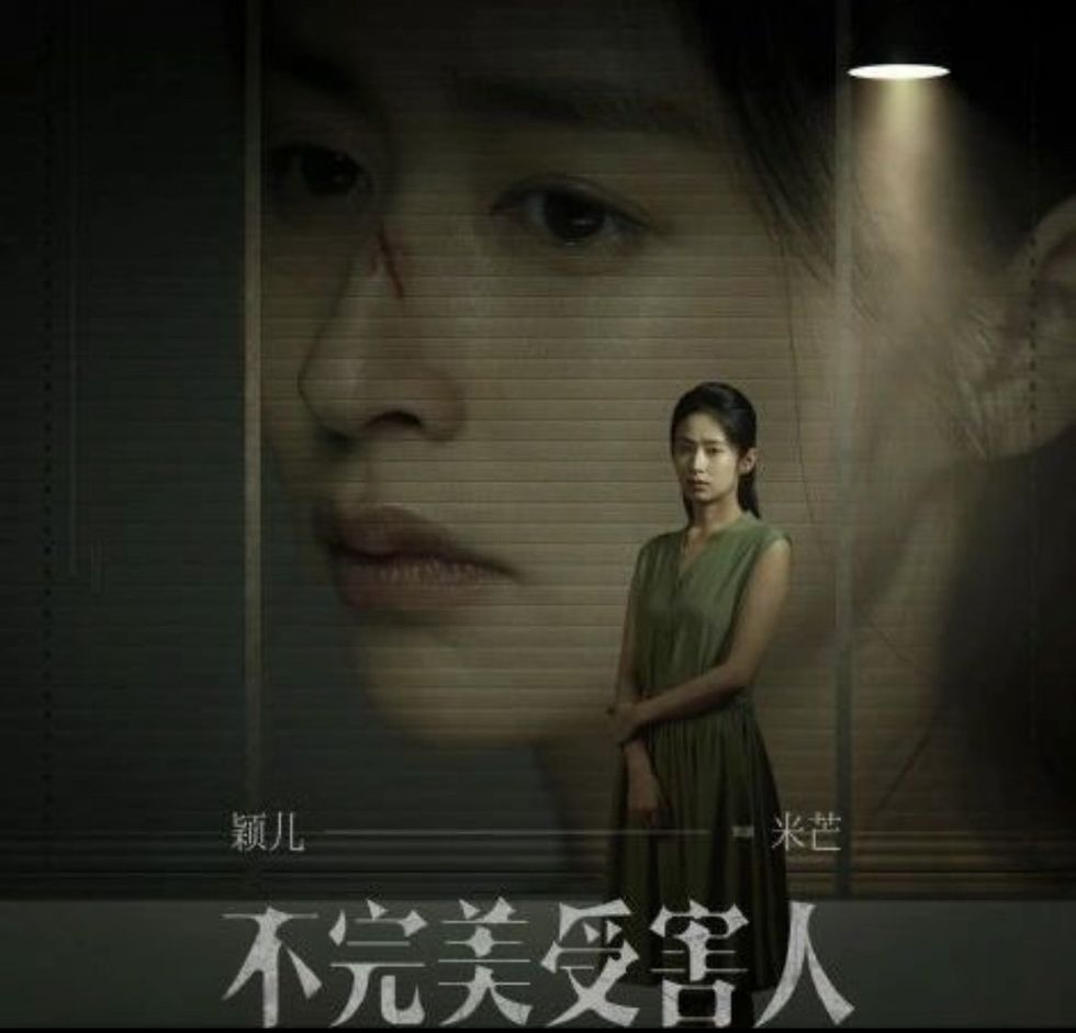 Image of a woman standing.