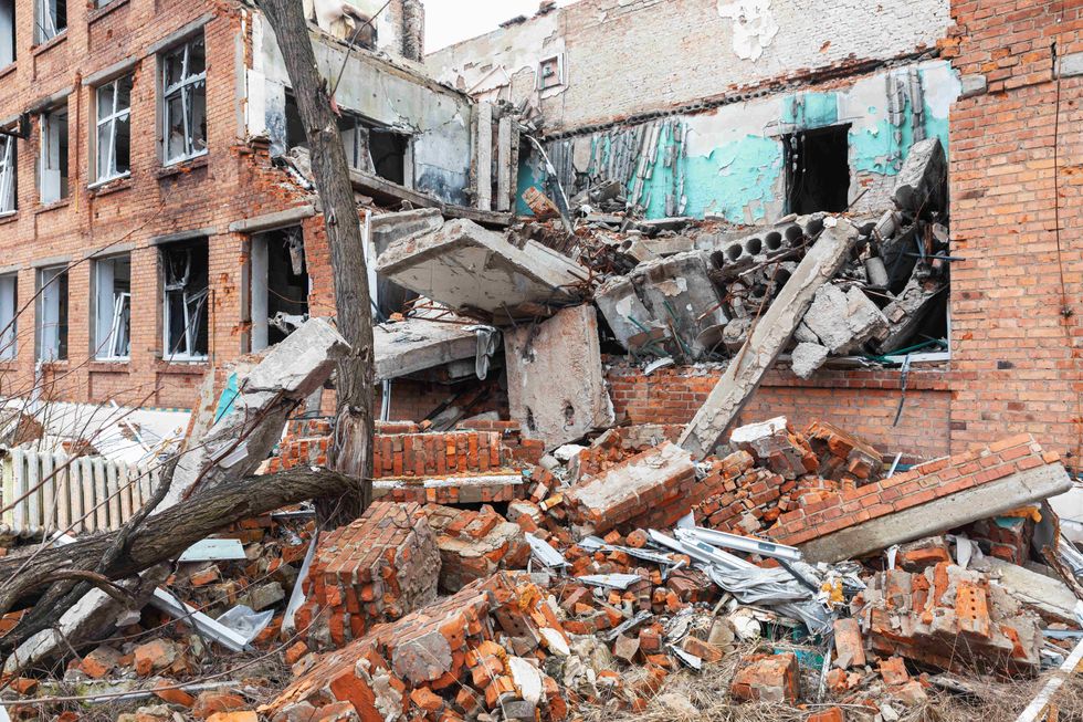 Image of an apartment block destroyed in an explosion caused by rocket fire in Izyum.