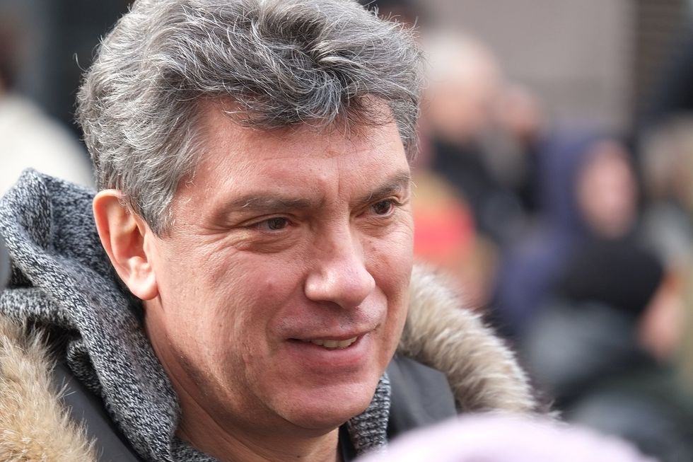 Image of Boris Nemtsov, famous Russian liberal politician and Putin critic, looking ahead and smiling.