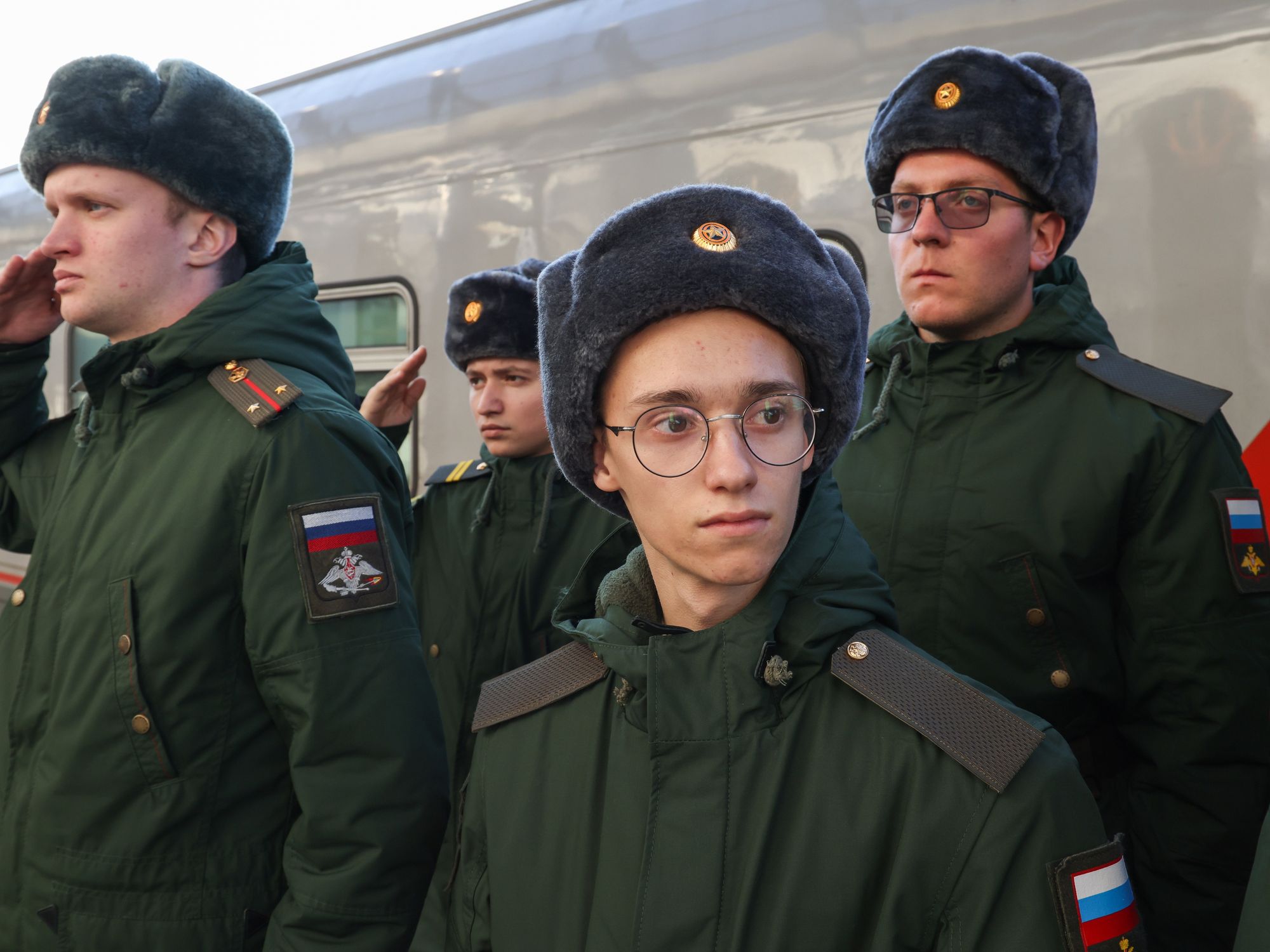 Image of conscripts are seen at a railway station before departing for military service in military units of Russia's Western Military District