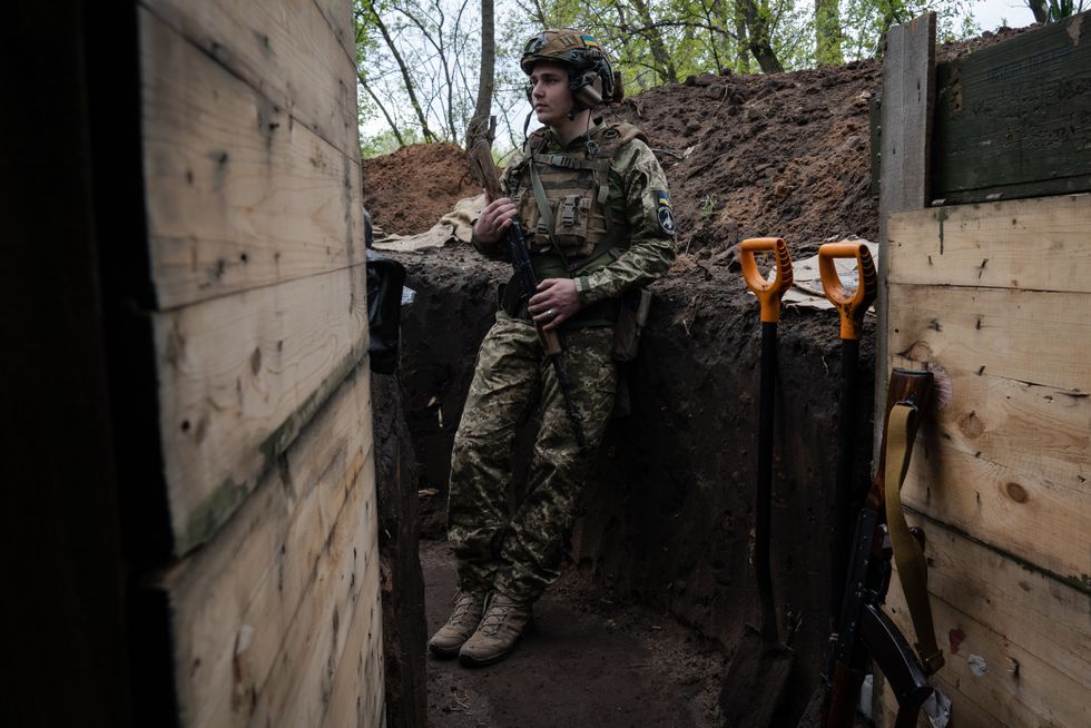 Image of ​an Ukrainian soldier in a trench, 1 km away from Russian position near Soledar.