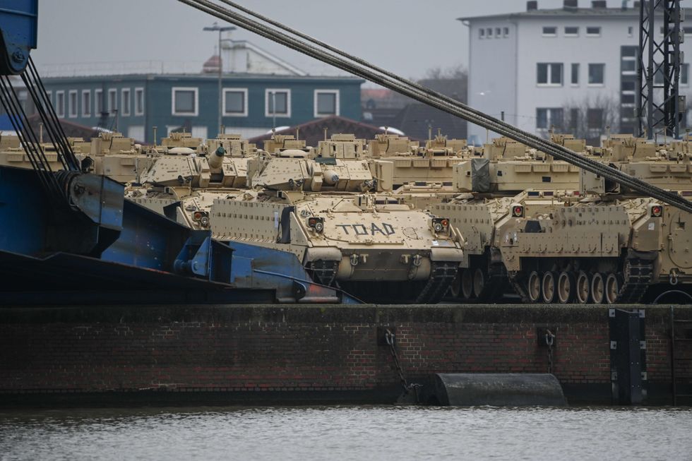 Image of ​US tanks and helicopters arriving in Bremerhaven, Germany, with the cargo transporter ''Endurance."