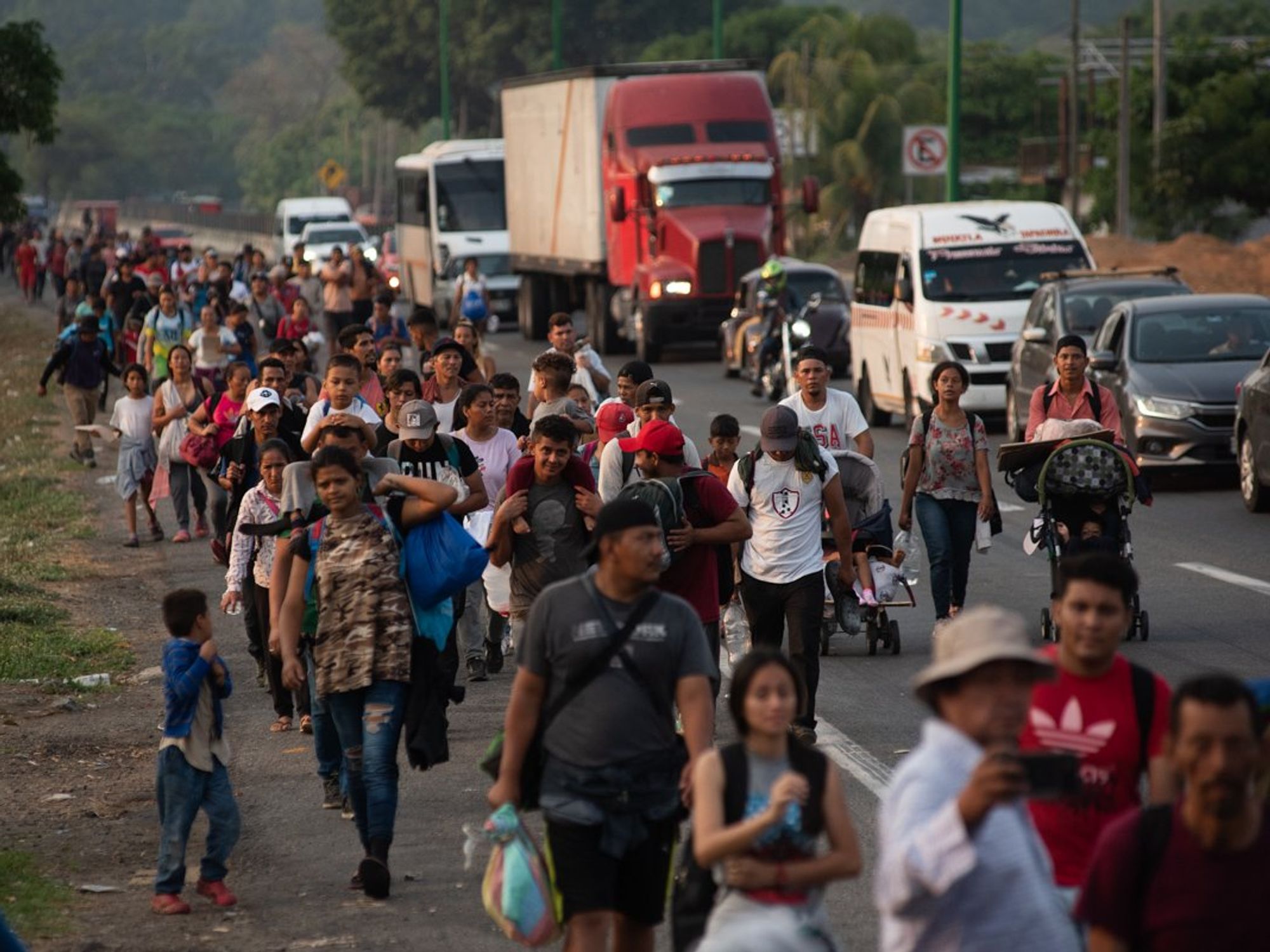 Image of Nearly 4,000 migrants from Central America walking the roads of Chiapas in the Migrant Stations of the Cross Caravan.