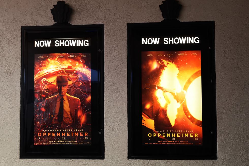 image of Oppenheimer movie posters showing at a cinema
