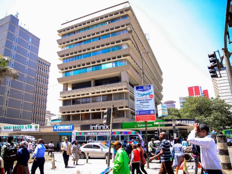 Image of pedestrians walking past the busy traffic at Tom Mboya Street on February 13, 2023 in Nairobi, Kenya.
