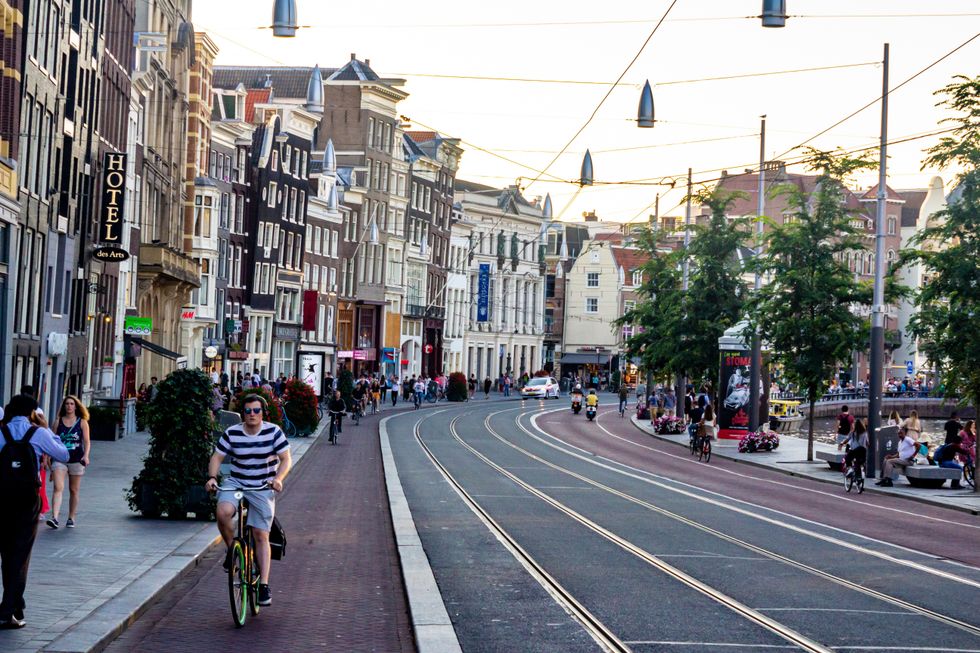 Image of people biking in Amsterdam, Netherlands.