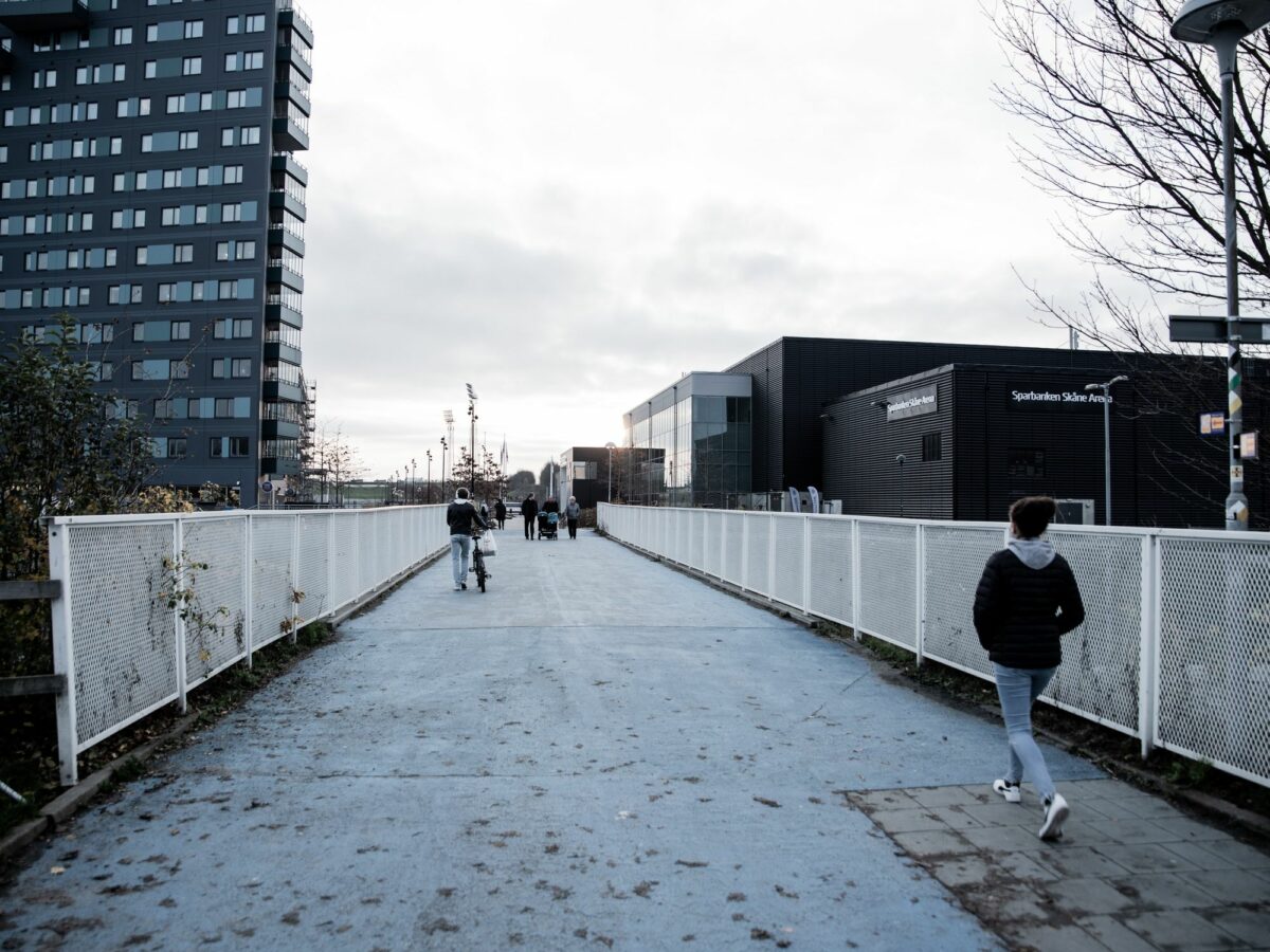 Image of people walking in the street.