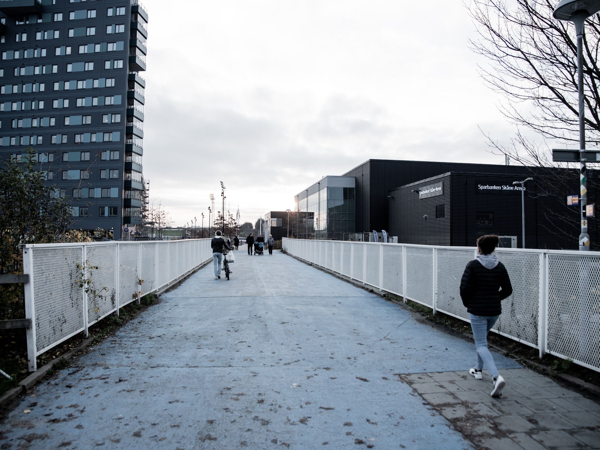 Image of people walking in the street.