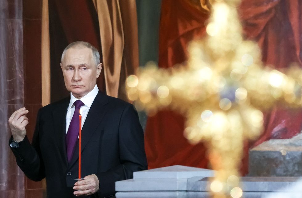 image of R​ussian President Vladimir Putin attending an Orthodox Easter service at the Cathedral of Christ the Saviour