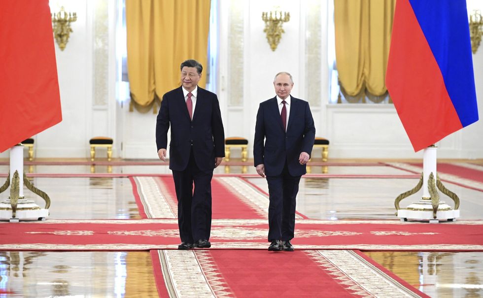 Image of Russian President Vladimir Putin and Chinese President Xi Jinping at the Kremlin Palace in Moscow, Russia.