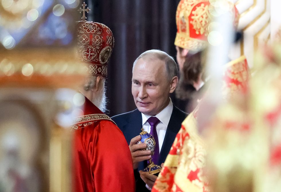 Image of Russian President Vladimir Putin attending an Orthodox Easter service at the Cathedral of Christ the Saviour in Moscow.