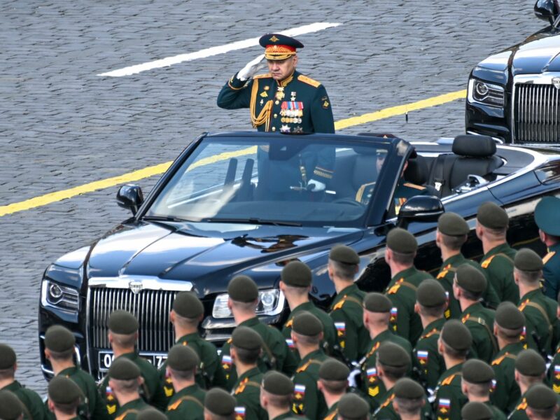 Image of Russia's Defence Minister Sergei Shoigu on an Aurus Senate convertible reviews troops during a Victory Day military parade in Red Square, Moscow.