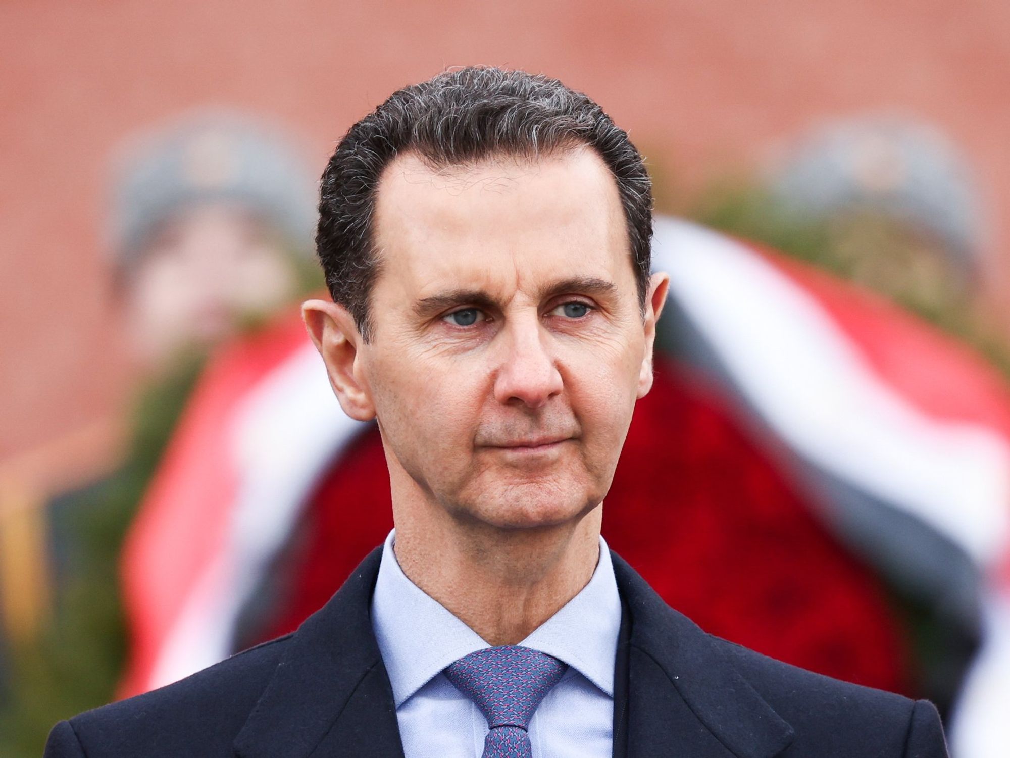 Image of Syria's President Bashar al-Assad during a wreath laying ceremony at the Tomb of the Unknown Soldier by the Kremlin Wall.
