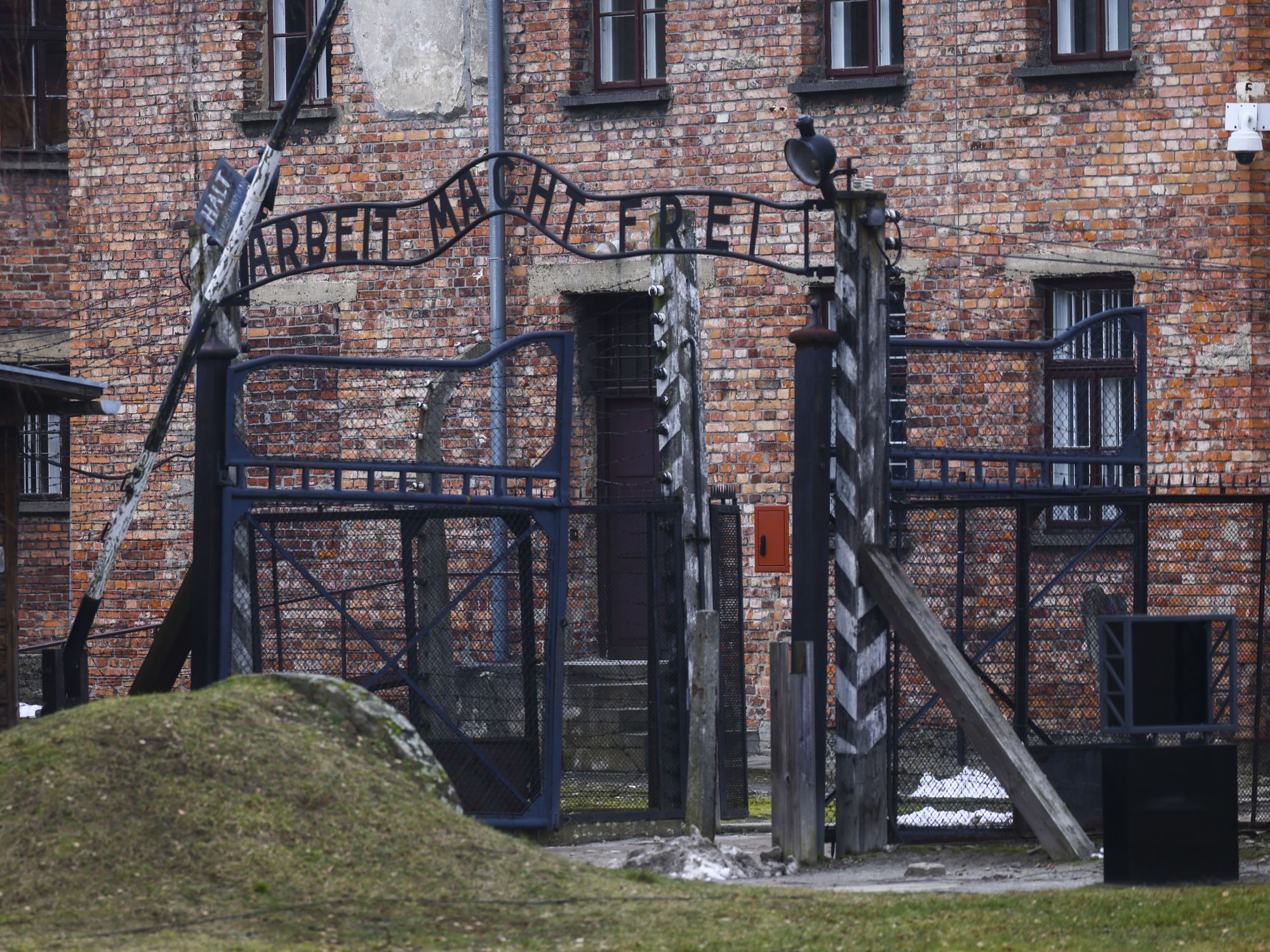Image of the entrance gate with 'Arbeit Macht Frei' inscription in the former Nazi German Auschwitz I concentration camp at Auschwitz Memorial Site, in Oswiecim, Poland.