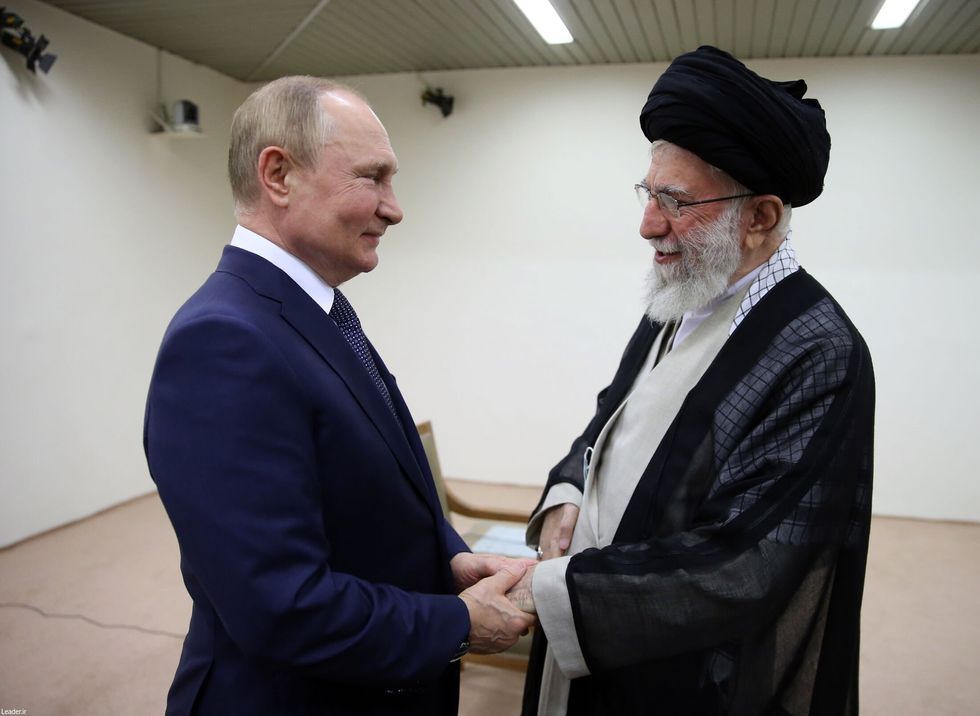 Image of the Iranian Supreme Leader Ayatollah Ali Khamenei receiving Russian President Vladimir Putin in Tehran, Iran.