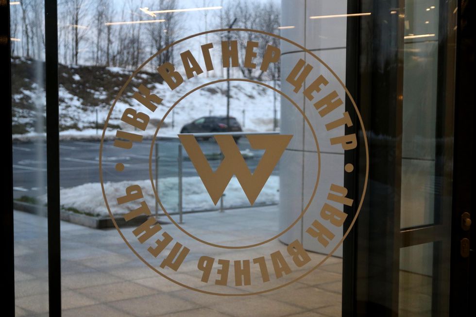 Image of the Private Military Company Wagner Center Logo on the door of a building in Saint Petersburg, Russia.