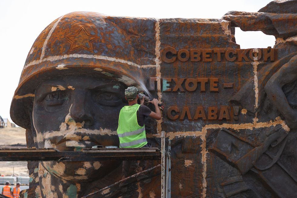 Image of the reconstruction works on the Savur-Mohyla memorial take place in Shakhtarsk District, Ukraine.