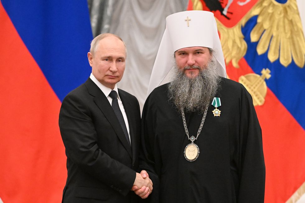 Image of two men shaking hands