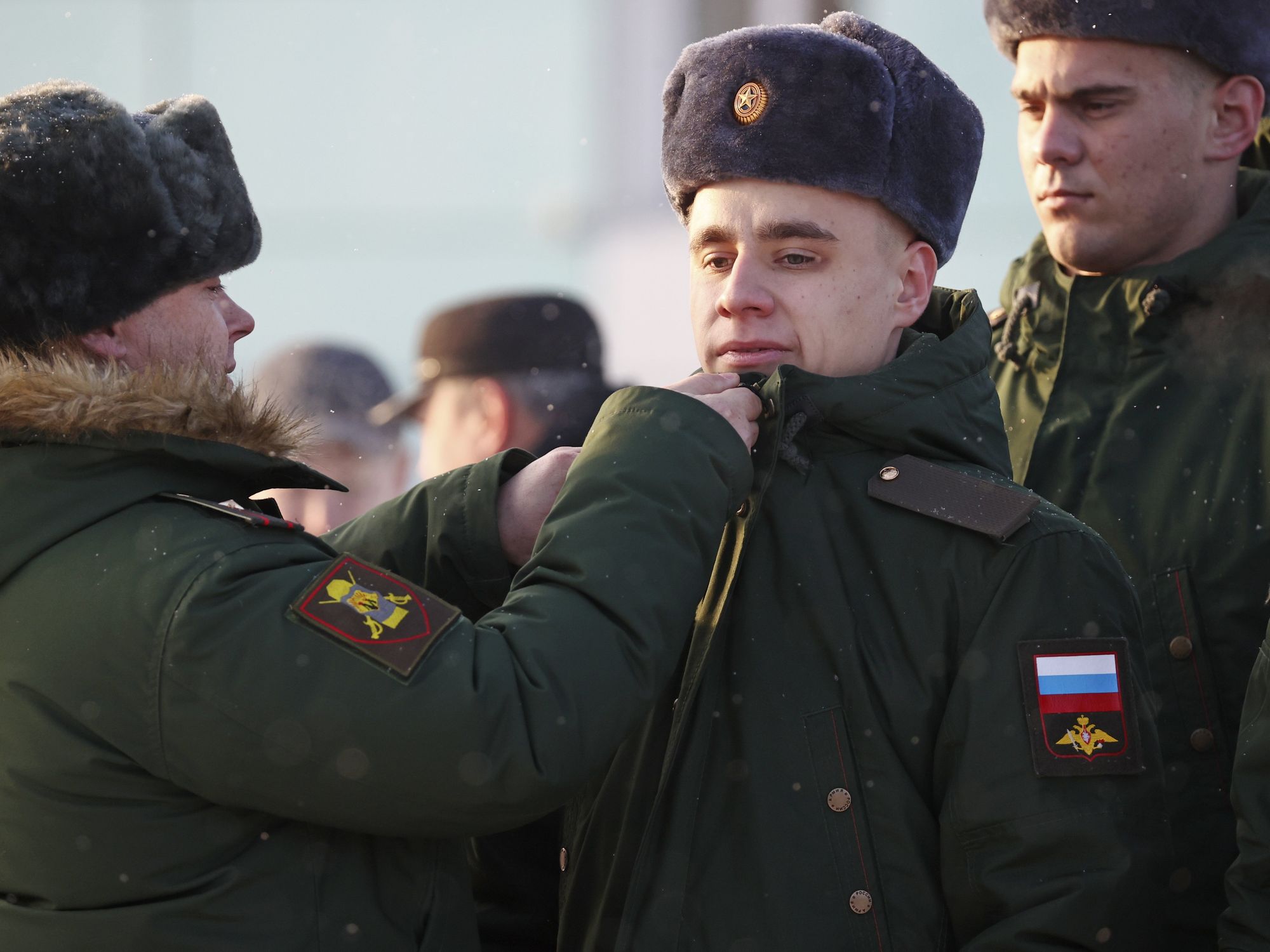 Image of two Russian soldiers in Uniform at the Novosibirsk-Glavny railway station before departing for service.​